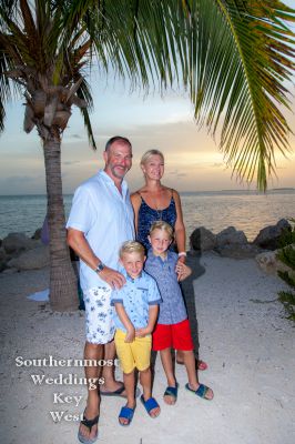 Family poses for photos at Ft. Zachary Taylor by Southernmost Weddings Key West