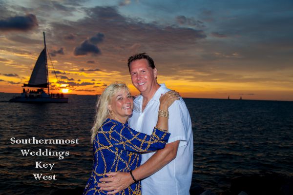 Couple cerebrate their anniversary with a photo session by Southernmost Weddings 