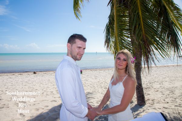 Elopement ceremony under a palm tree in Key West, FL.