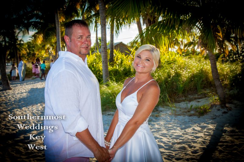 Wedding Couple getting Married on Smathers Beach by Southernmost Weddings Key West