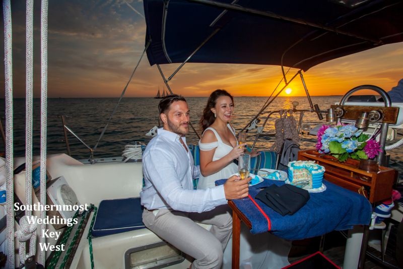 Wedding couple enjoying a Private Sunset Sail after their wedding with Southernmost Weddings Key West