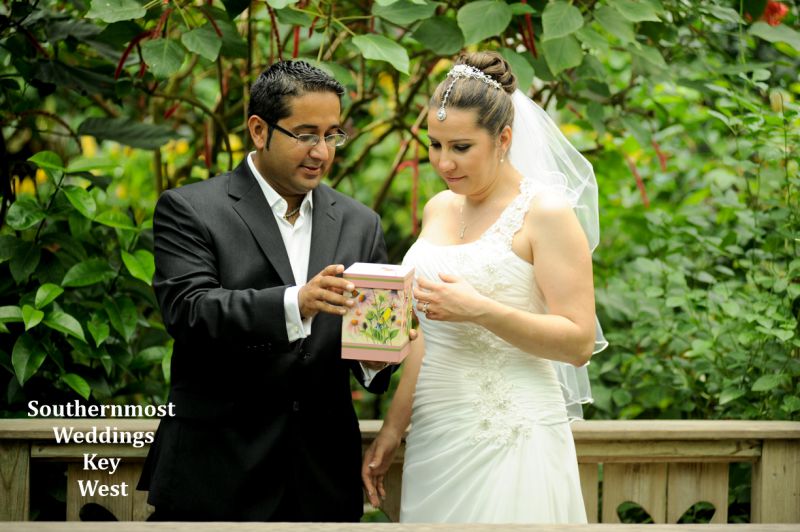 Wedding couple release butterflies after their wedding ceremony by Southernmost Weddings Key West