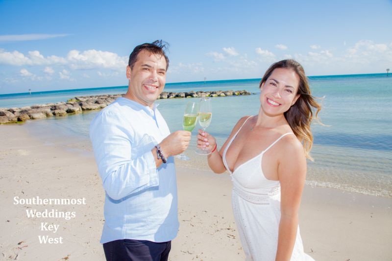 Wedding couple poses for photos after their wedding by Southernmost Weddings Key West