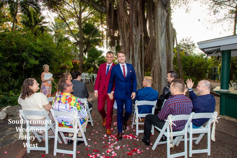 Wedding couple getting married at the West Martello Towers Tropical Garden