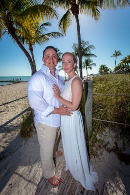 Wedding couple on Smathers Beach in Key West, Florida after their elopement by Southernmost Weddings